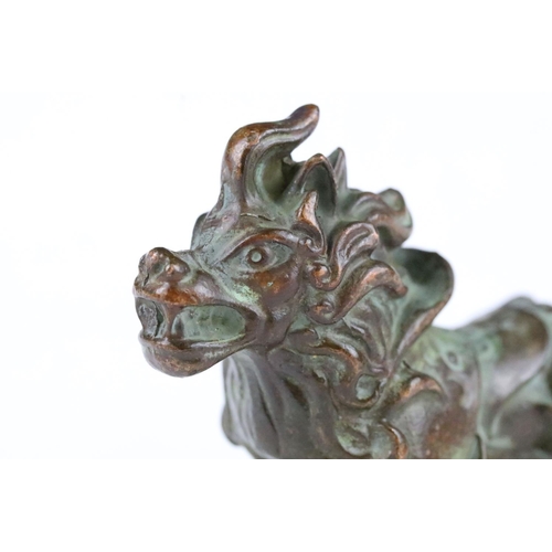 183 - A Chinese ornamental bronze dog of foo statue