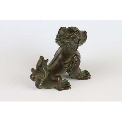 185 - A Chinese ornamental bronze dog of foo statue