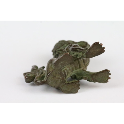 185 - A Chinese ornamental bronze dog of foo statue