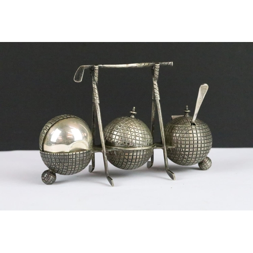 194 - Group of vintage golfing items to include a silver plated cruet set in the form of golf balls in a c... 