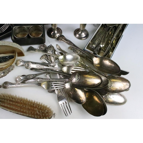 209 - A collection of mainly silver plated items to include cutlery, teapot, vases...etc.. to include some... 