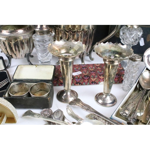 209 - A collection of mainly silver plated items to include cutlery, teapot, vases...etc.. to include some... 