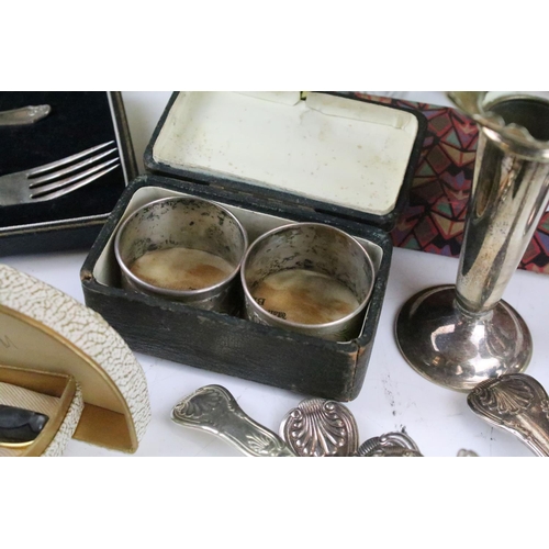 209 - A collection of mainly silver plated items to include cutlery, teapot, vases...etc.. to include some... 