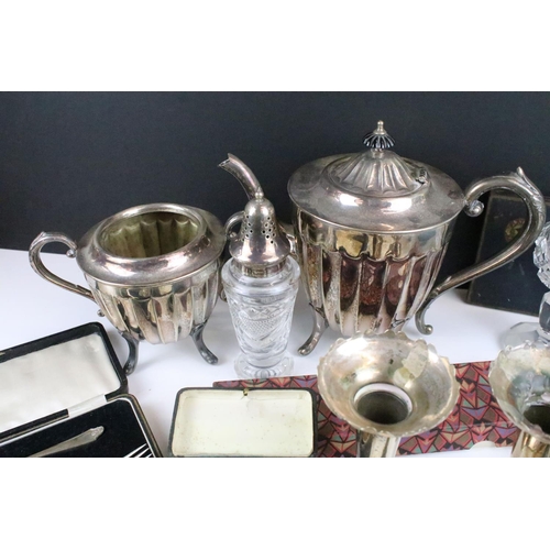 209 - A collection of mainly silver plated items to include cutlery, teapot, vases...etc.. to include some... 