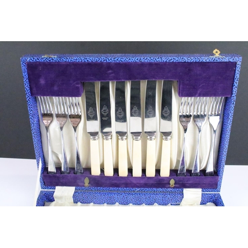 211 - A cased set of six fully hallmarked sterling silver spoons with scalloped bowls together with a silv... 