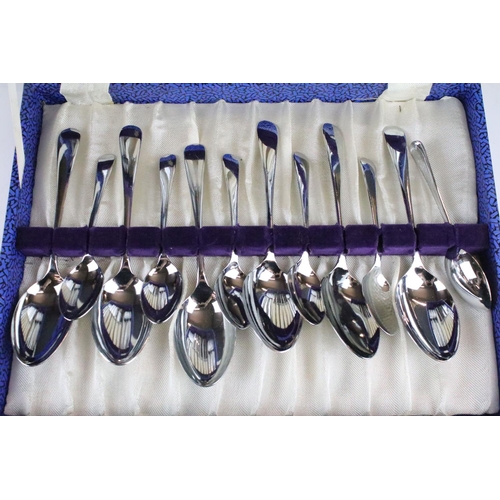 211 - A cased set of six fully hallmarked sterling silver spoons with scalloped bowls together with a silv... 