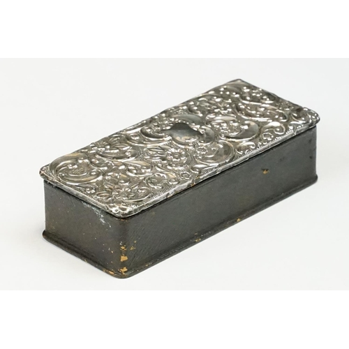 212 - An antique leather stamp box with four section sloped interior, silver repousse panel to top, maker ... 