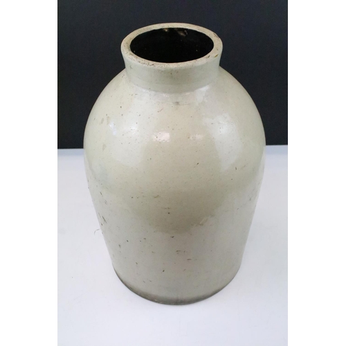 223 - A large antique stoneware three gallon jug / flagon, stands approx 40cm in height.