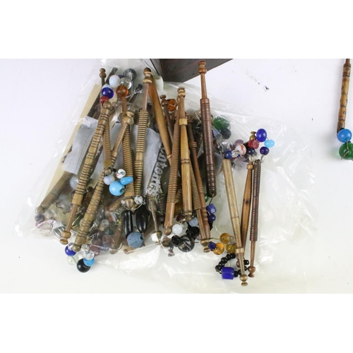 230 - Collection of antique lace bobbins to include bone and turned wooden examples, some decorated with b... 