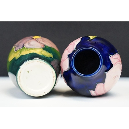 24 - Group of Moorcroft pottery, four pieces, to include a blue ground Magnolia pattern vase (approx 9cm ... 