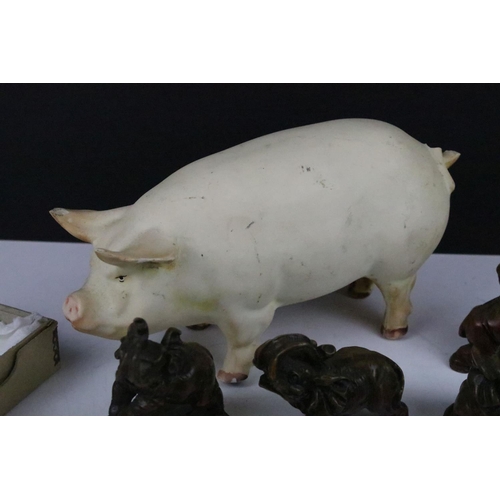 251 - Plaster butchers type plaster model of a standing pig (approx 22cm long), together with a group of w... 