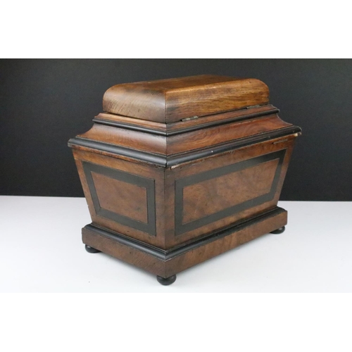 252 - 19th Century tea caddy of sarcophagus form, opening to a twin compartment mahogany lidded interior, ... 