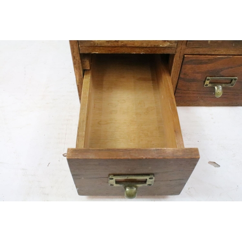 255 - Early 20th century oak chest of four small office drawers, 30.5cm high x 38cm wide x 49cm deep