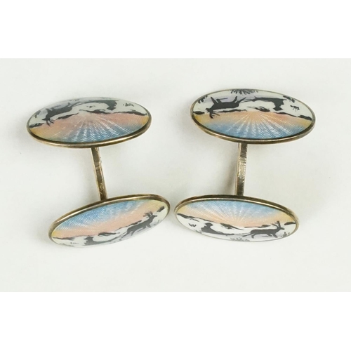 256 - A pair of scandinavian 925 sterling silver and enamel cufflinks, four enamel panels with stag and sl... 