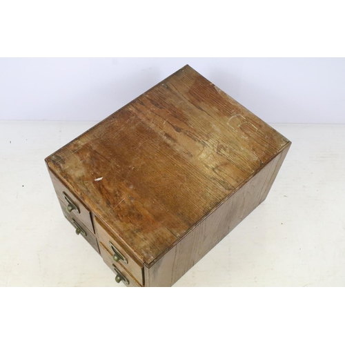 258 - Early 20th century oak chest of four small office drawers, 30.5cm high x 38cm wide x 49cm deep