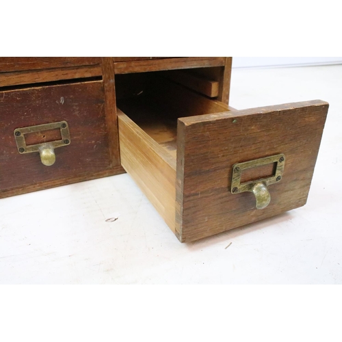 260 - Early 20th century oak chest of four small office drawers, 30.5cm high x 38cm wide x 49cm deep