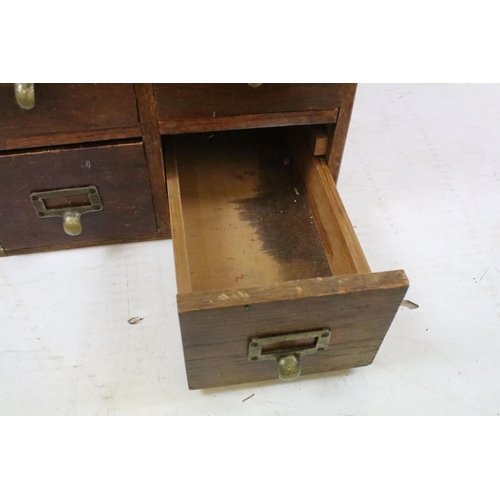 260 - Early 20th century oak chest of four small office drawers, 30.5cm high x 38cm wide x 49cm deep