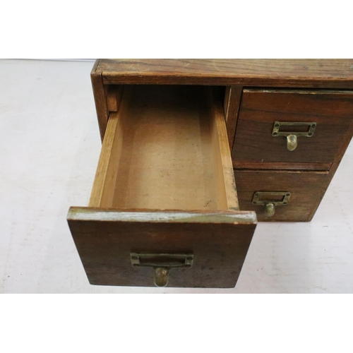 260 - Early 20th century oak chest of four small office drawers, 30.5cm high x 38cm wide x 49cm deep