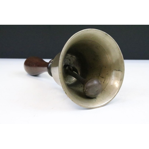 266 - Brass bell with turned wooden handle, approx 10