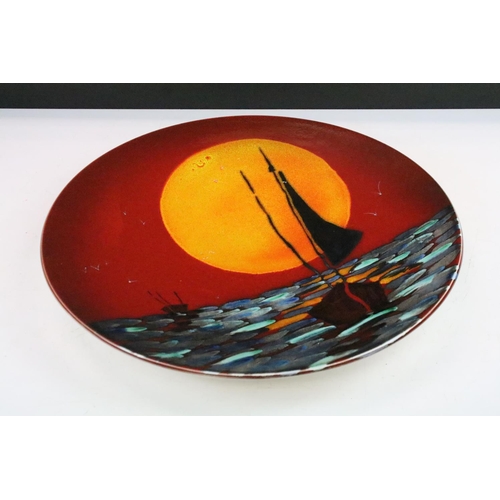 267 - Anita Harris 'Coming Home' charger with red ground, signed & stamped to base, 41cm diameter