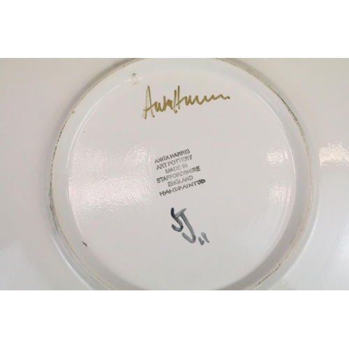 267 - Anita Harris 'Coming Home' charger with red ground, signed & stamped to base, 41cm diameter