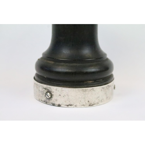 29 - An ebonised wooden pepper mill with fully hallmarked sterling silver collars, assay marked for Birmi... 