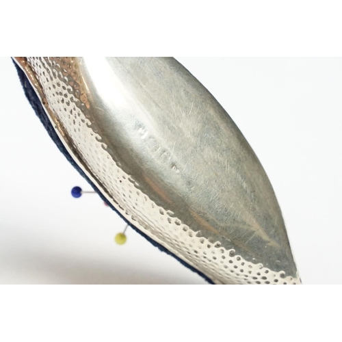 290 - An early 20th century fully hallmarked sterling silver pin cushion in the form of a canoe, makers ma... 