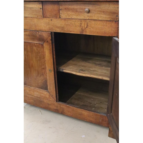 335 - Early 20th C sideboard with two doors under two drawers and internal shelf, brass fittings, locking ... 