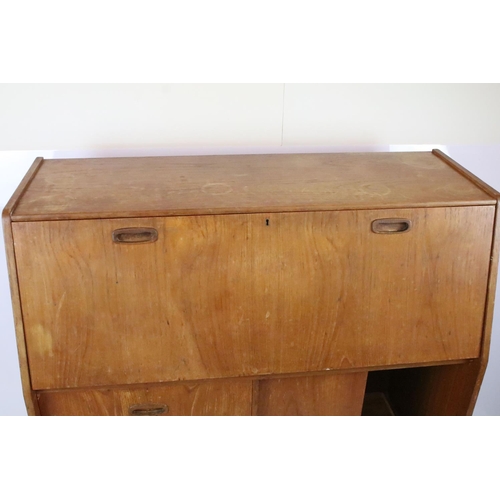 336 - Mid 20th C teak bureau with fold down door and fitted interior, twin drawer with sliding cupboard, 1... 