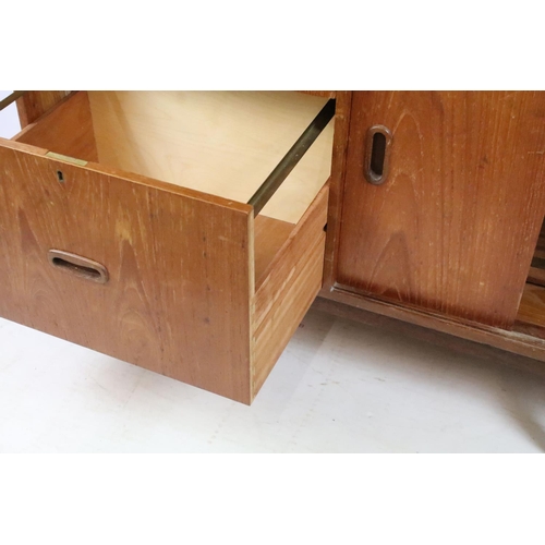 336 - Mid 20th C teak bureau with fold down door and fitted interior, twin drawer with sliding cupboard, 1... 