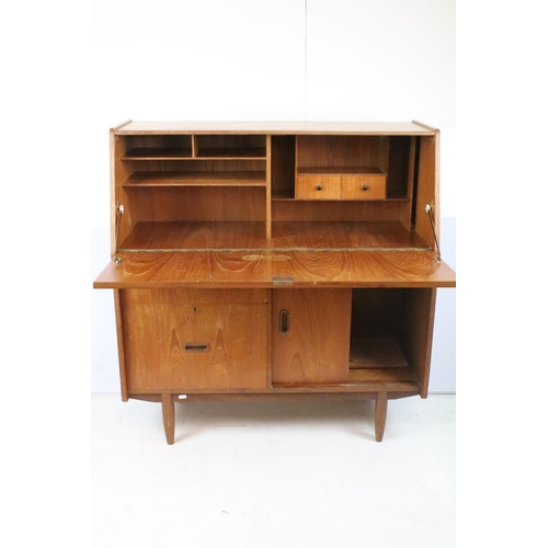 336 - Mid 20th C teak bureau with fold down door and fitted interior, twin drawer with sliding cupboard, 1... 