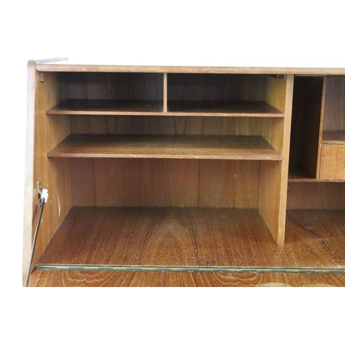 336 - Mid 20th C teak bureau with fold down door and fitted interior, twin drawer with sliding cupboard, 1... 