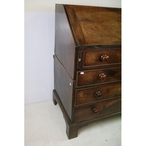 338 - 19th C mahogany bureau with fitted interior above four long drawers, sliding supports,  108 x 105 x ... 