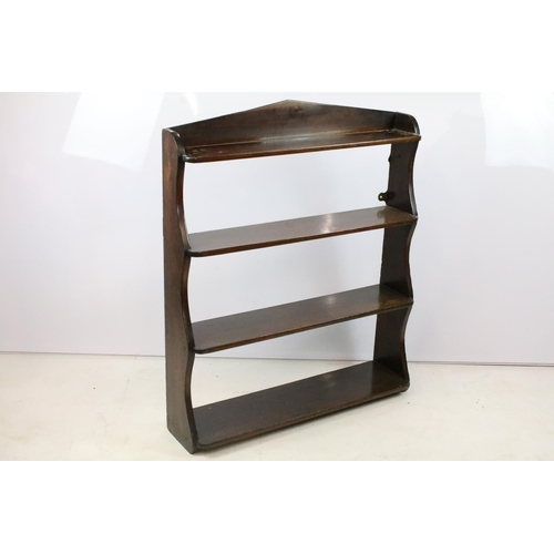 343 - Late 19th / Early 20th C mahogany hanging shelves of four tiered shelves, 92cm in approx height