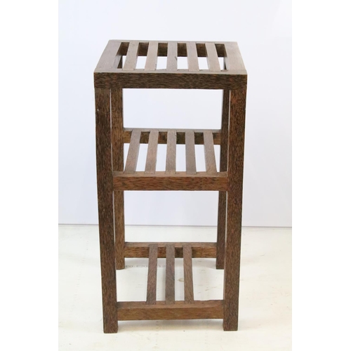 348 - Tropical hardwood three tier slatted stand, 55cm high x 30cm wide x 28cm deep