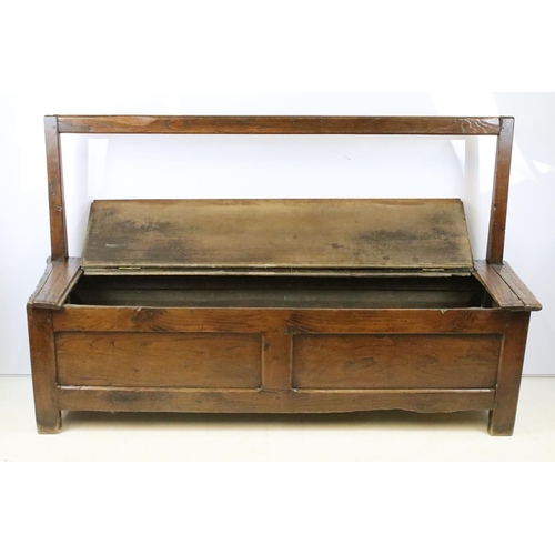 359 - 19th century oak bench / settle, the seat lids to reveal storage, with panelled front, 94cm high x 1... 