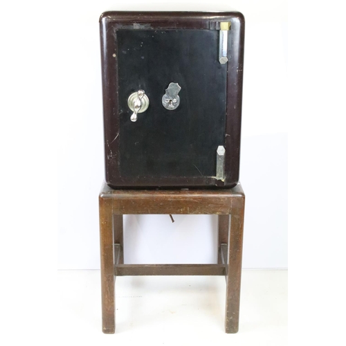 360 - Early 20th century safe, with key 55.5cm high x 43cm wide x 43cm deep