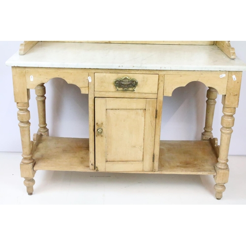 361 - Victorian pine washstand, with carved pediment and tiled back and marble top above single drawer and... 