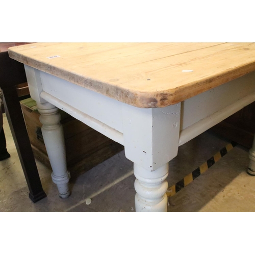 365 - Early 20th century pine kitchen table, on turned tapering legs, 74.5cm high x 107cm wide x 75cm deep