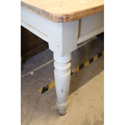 365 - Early 20th century pine kitchen table, on turned tapering legs, 74.5cm high x 107cm wide x 75cm deep