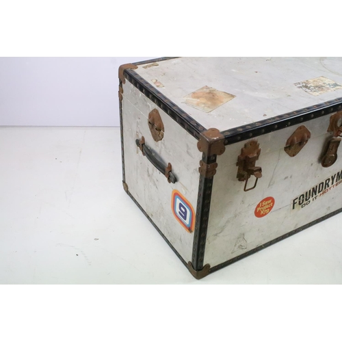 366 - Vintage metal travel trunk with souvenir stickers to the sides and lids and metal locks with black b... 