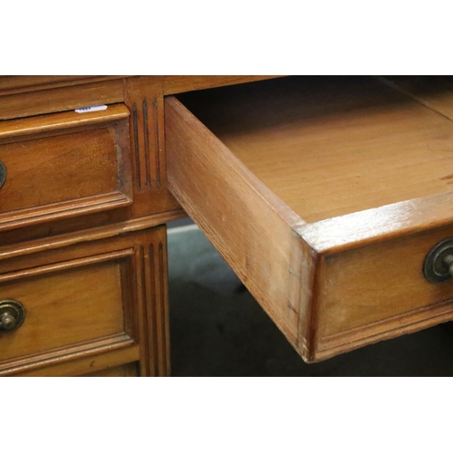 368 - Early 20th century mahogany twin pedestal desk with leatherette inset top, above an arrangement of n... 