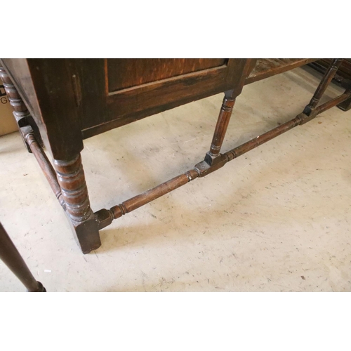 370 - Early 20th century oak sideboard, with lead glazed cupboard and shelves above central drawer, flanke... 