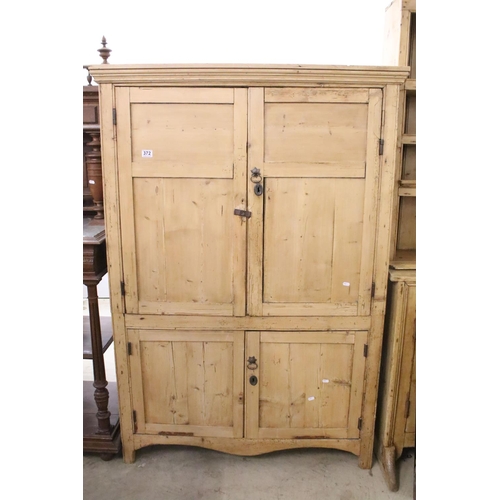 372 - 19th century pine housekeeper's cupboard, with two doors to upper section above two further doors, s... 