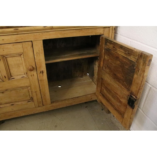 373 - 19th Century stripped pine Irish dresser with 3 x shelves and two doors to base, 75