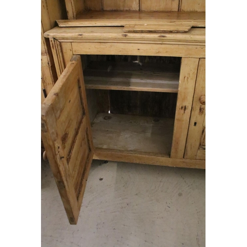 373 - 19th Century stripped pine Irish dresser with 3 x shelves and two doors to base, 75