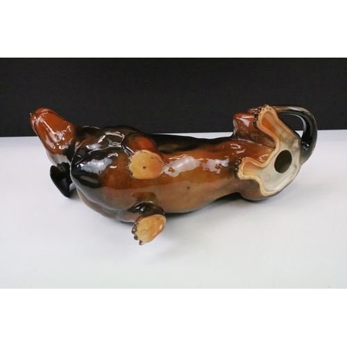 39 - Large Beswick Dachshund ceramic figure in black with brown finish, marked to base, 13.5