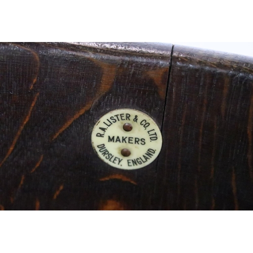 47 - Early 20th century oak coopered barrel with liner, on carved oak stand, maker's label for R.A.Lister... 