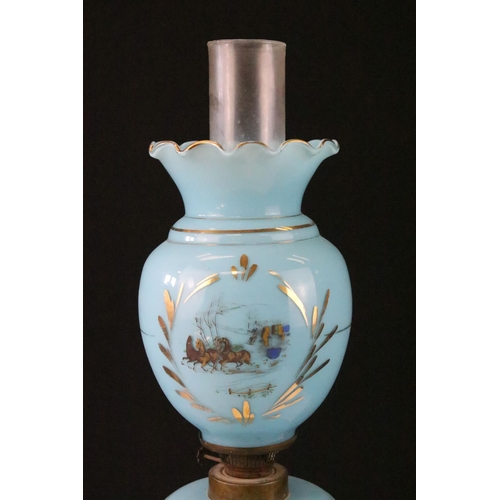 52 - 19th century blue glass oil lamp decorated with horse & cart scenes, with gilt details, complete wit... 