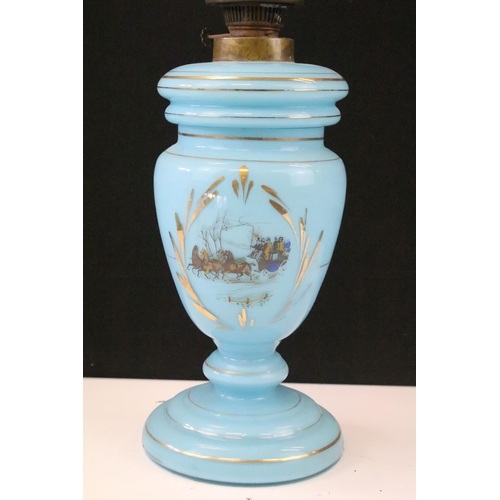 52 - 19th century blue glass oil lamp decorated with horse & cart scenes, with gilt details, complete wit... 